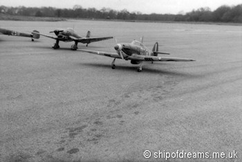 Stuka and Hurricane on runway